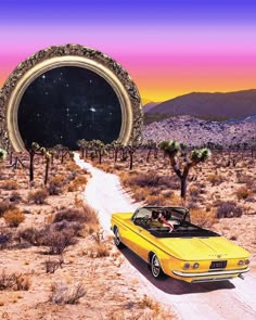 a yellow convertible car driving down a dirt road in front of a giant round mirror