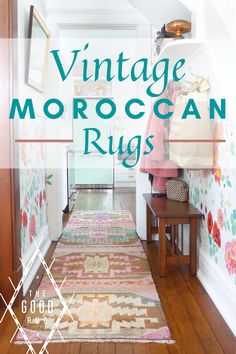 the hallway is decorated with vintage moroccan rugs