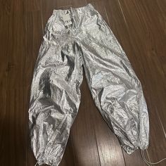 Zara Silver Jogger Pants Metallic Wide Leg Bottoms With Pockets, Metallic Wide Leg Summer Bottoms, Metallic Wide Leg Bottoms For Summer, Casual Metallic Bottoms With Elastic Waistband, Metallic Straight Leg Bottoms For Spring, Casual Metallic Bottoms With Pockets, Metallic Wide Leg Summer Pants, Metallic Wide Leg Pants For Summer, High Waist Metallic Pants For Summer