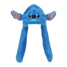 a blue hat with ears and eyes on it's head, sitting up against a white background