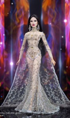 a barbie doll dressed in an elaborate gown