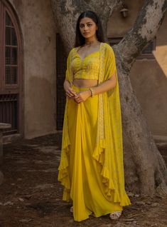 Seema Thukral-Yellow Embellished Cape With Cami Top And Draped Skirt-INDIASPOPUP.COM Simple Frock, Yellow Drapes, Haldi Dress, Marriage Ideas, Haldi Outfits, Simple Frock Design, Haldi Outfit, Yellow Embroidery, Cape Designs