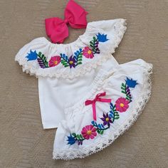 Beautiful Mexican Embroidered Blouses With Bloomer Also Embroidered, Hair Bow Included. Back Side Of The Off The Shoulder Blouse Isn’t Embroidered Only Front Side . Back Side Of The Bloomer Is Embroidered, Not The Front Side . Fabric: Cotton- Manta New- No Tags - Handmade I Recommend Ordering According To Infant Actual Age .. They Are Made Tru To Size Average Child Age . Hand Wash Only- Each Outfit Has Unique Colorful Embroidery. Embroidered Blouses, Colorful Embroidery, Off The Shoulder Blouse, Embroidered Blouse, Hair Bow, Matching Sets, Hair Bows, Off The Shoulder, Kids Shop