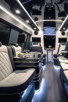 the inside of a limo with leather seats and black trimmings on the walls