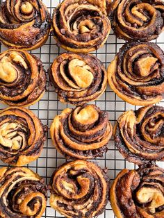 chocolate cinnamon rolls on a cooling rack ready to be baked in the oven for dessert