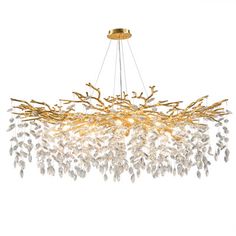 a large chandelier with many lights hanging from it's sides and branches