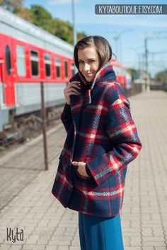 "Elegant short coat for women for autumn and spring seasons. Stylish plaid coat made from soft and warm wool fabric. Feminine, button up wool coat with wide silhouette, classical open collar and two side pockets. It is perfect outside wear solution when warmth and elegance has to be combined! Your will love the quality and design. Sewn with meticulous attention to every detail! DETAILS: * Wool coat for maximum comfort and elegance * Oversize design * Two large side pockets * Custom size upon you Stylish Raincoats, Coat For Fall, Raincoat Outfit, Short Coats Women, Pants Outfit Fall, Autumn Coat, Women Coat, Coat For Women, Plaid Coat