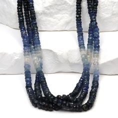 Ombre Blue and White Sapphire 4mm Hand Faceted Rondelles Bead Strand Discover the enchanting allure of our 16" Full Bead Strand of Ombre Blue and White Sapphire Faceted Rondelles. These exquisite 4mm beads are meticulously crafted, showcasing a captivating gradient from deep blue to pristine white. As a gemstone wholesaler, we provide these high-quality sapphire beads that are perfect for creating unique, luxurious jewelry pieces. Their faceted rondelle shape enhances their sparkle, catching the Sapphire Beads, Luxurious Jewelry, Blue Ombre, White Sapphire, Bead Strand, Natural Beads, Semi Precious Gemstones, Luxury Jewelry, Deep Blue