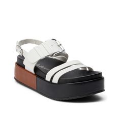 Matisse-Greta Platform Sandal Carry your style with grace wearing the Greta platform sandal from Matisse. A colorblocked design with buckle closures and a thick platform gives an urban touch to this slingback sandal. With the padded footbed, your feet stays comfy all day. Dad Sandals, Flatform Sandals, Leather Platform Sandals, Slingback Sandal, Sneaker Brands, Kids Bags, Platform Heels, Platform Sandals, White Leather