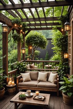 an outdoor living area with couches, tables and potted plants on the deck