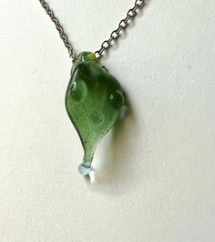 Shiny green glass leaf with water droplets pendant, chain is optional. Handmade from borosilicate glass. Syracuse Ny, Water Droplets, Leaf Pendant, Glass Pendant, Green Glass, Glass Pendants, Jewelry Necklace Pendant, Jewelry Necklaces, Pendant Necklace