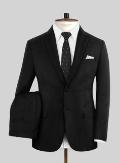 The black suit is often associated with formal wear, symbolizing refined style, and in this regard, our Lanificio Zegna Deep Black Wool Suit perfectly embodies the essence of a black suit. Made from pure wool fibers, it boasts a deep black hue with a solid texture that exudes confidence and elegance. Whether you're attending a wedding, a gala, or a black-tie event, this suit is sure to make a statement.  Look Includes    Lanificio     Zegna     Deep     Black     Wool  Fabric  Two Button Jacket Sharkskin Suit, Grey Wool Suit, Flannel Suit, Tailored Suit, Herringbone Tweed, Grey Tweed, Tweed Suits, Silk Suit, Linen Suit