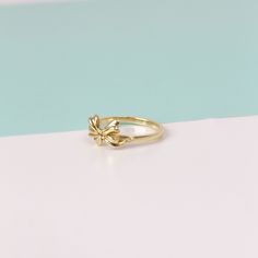 14k Gold Ribbon Ring | Genuine Solid Gold Ring | Ribbon Shape Gift For Her ➤ Ring Details * 14k / 18k Yellow Gold or Yellow Sterling Silver * Gold Color Options; 14K / 18k White, Yellow, Rose Gold * Sterling Silver Color Options; Yellow, Rose, White * Top Width: 9 mm * Top Length: 9 mm * Band Width: 1.90 mm * Band Thickness: 1.45 mm * Ready to Ship 3-5 Business Days 💍 ISEA Jewels' pieces are handcrafted by 10-15 years of experienced craftsmen and made to order in a very short time. 🎁 All piece Yellow Gold Birthstone Ring Made Of Recycled Gold, Yellow Gold Flower Ring With Birthstone In 14k Gold, 14k Gold Flower Ring With Birthstone For Anniversary, 14k Yellow Gold Flower Ring With Birthstone, Fine Jewelry 14k Gold Flower Ring For Anniversary, 14k Gold Flower Ring For Anniversary, 14k Yellow Gold Cluster Ring With Birthstone, 14k Gold Open Cluster Ring Gift, 14k Gold Flower Ring For Anniversary With Round Band