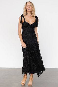 Timeless charm and modern details create a memorable look Black lace over lining Sweetheart neckline Padded bust Hidden zipper at back for closure Self-tie sleeve straps Single-tiered skirt Self and Lining: 100% Polyester Trina is 5'6, cup size 32D, size 2 and is wearing size S Lace Dress With Tie Back And Sweetheart Neckline, Lace Party Dress With Tie Back, Lace Dress With Lace-up Back For Brunch, Elegant Lace Dress With Sweetheart Neckline For Brunch, Chic Lace Dress With Lace-up Back, Chic Lace Dresses With Lace-up Back, Evening Lace Dress With Tie Back, Elegant Lace Dress With Lace-up Back, Lace Evening Dress With Tie Back