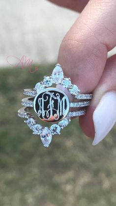 Item Description: Our monogram Crystal cubic zirconia Ring is 925 Sterling Silver. This gorgeous monogram ring comes with one (1) engraved ring and two (2) additional bands. The engraving size is 1/4 The ring is pure Sterling Silver with Rhodium ontop to help resist against tarnishing elements. Please note the ring in the display is reflecting off of our camera. Silver is very reflective and reflects off of anything in front of it. The ring is all silver. This ring comes with a FREE pink polishi Monogram Rings, Antique Wedding Rings, Engraved Ring, Monogram Ring, Jewelry Tags, Cubic Zirconia Jewelry, Wedding Rings Unique, Cz Ring, 14k White Gold Ring