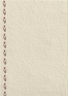 a white paper with pink flowers on the edges and a border in the middle that has been stitched together