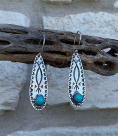 "These traditional southwest style, tear drop earrings are perfect for any occasion or every day wear. They are solid sterling silver and are adorned by a 6mm round Kingsman Turquoise stone. Each earring measures 1.5\" long and at it's widest point is .5\". **Each Stone varies in color, the stone pictured will NOT be the one you receive, if you have a color preference, as in a little more green or a little bluer, please leave a message in the notes section of your order and we will try to accomm Southwestern Turquoise Teardrop Earrings, Southwestern Teardrop Sterling Silver Earrings, Artisan Teardrop Earrings Stamped 925, Faith Jewelry, Tear Drop Earrings, Stone Pictures, Southwest Style, Style Earrings, Tear Drop