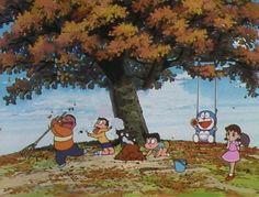 doraemon team under a tree with children playing in the ground and one person on a swing