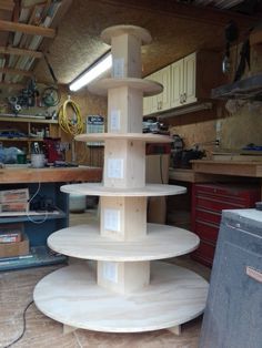 there is a three tiered cake stand in the garage