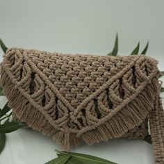 Macrame Shoulder Bag size is made in sizes: 10x6 inch (25x15 centimeter). Women's Accessory is handmade from natural cotton thread. Each piece is mindfully crafted and may vary slightly from photo. The Purse in the image is ecru color. if you want to different size tell us write. We can take special orders. You can contact us. Udesignaart Bohemian Brown Braided Beach Bag, Bohemian Braided Brown Beach Bag, Bohemian Braided Rectangular Bag, Bohemian Braided Beige Bag, Natural Macrame Shoulder Bag, Beige Macrame Rectangular Shoulder Bag, Beige Rectangular Macrame Shoulder Bag, Beige Rectangular Shoulder Bag With Macrame, Rectangular Beige Macrame Shoulder Bag