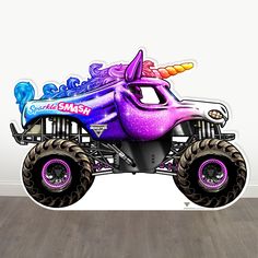 a purple monster truck with an unicorn on it's head and horns painted on the side