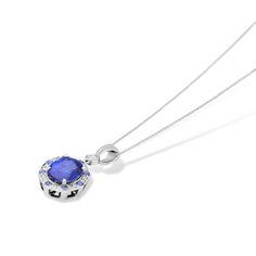 Surprise the one you adore with our Dianna Style Oval Cut Blue Sapphire Pendant Necklace. Crafted in 18K white gold, the shimmering pendant showcases an Oval Cut Blue Sapphire - artfully set to enhance size and sparkle - wrapped in a pave-lined diamond halo with small blue sapphires scattered throughout. This radiant look is one she'll turn to often, every day, and on special occasions. An amazing and thoughtful anniversary gift for your loved one.

Blue Sapphire 5.66&nb Oval Sapphire Necklace With Brilliant Cut, Oval Sapphire Necklace With Hallmark, Sapphire Oval Necklace With Diamond Cut, Oval Sapphire Necklace With Diamond Cut, Luxury Sapphire Oval Necklace, Luxury Oval Sapphire Necklace, Elegant Oval Tanzanite Necklaces, Oval Sapphire Necklace With Polished Finish, Luxury Oval Tanzanite Necklaces