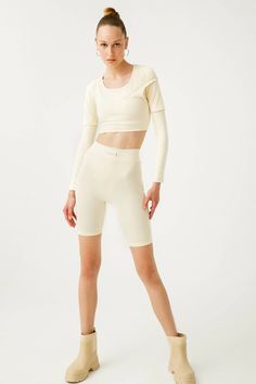 Made of high waist, light, soft and durable recycled fabric, it is the most comfortable complement to your most difficult top combinations with its special hip seams and lifting feature. You can create a sporty and stylish look with your short crop tops, sweatshirts and sneakers.Fabric: 80% recycled pes (repreve), 20% elastane (lycra)Machine wash at 30 degreesIt is prepared in special mold workshops in Turkey. High Stretch Cropped Activewear For Spring, Spring High Stretch Cropped Activewear, Cropped High Stretch Spring Activewear, Spring Cropped High Stretch Activewear, Spring Activewear With Built-in Shorts For Streetwear, Spring Streetwear Activewear With Built-in Shorts, Sporty Compressive Crop Top For Spring, Spring Sporty Compressive Crop Top, Trendy Workout Tops With Built-in Shorts