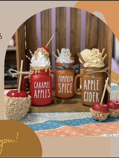 there are four jars with apples and cinnamons in them