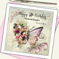 a birthday card with a butterfly and flowers