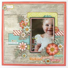 a scrapbook page with an image of a baby in the center and flowers on it