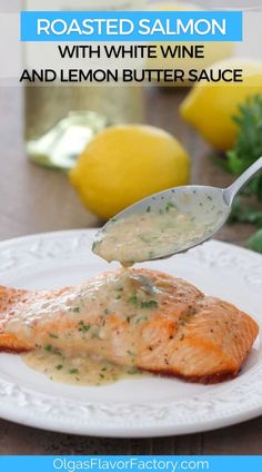 a white plate topped with salmon covered in gravy