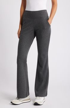 Keep things casual and comfortable in these stretch ponte-knit leggings that are styled with a wide waistband and flare legs for an easy, flowy fit. 32" inseam Pull-on style Front slant pockets 64% rayon, 32% nylon, 4% spandex Machine wash, dry flat Imported Stretch Wide-leg Yoga Pants For Lounging, Casual Flare Yoga Pants For Loungewear, Casual Wide-leg Elastane Yoga Pants, Casual Flare Stretch Yoga Pants, Wide Leg Elastane Yoga Pants For Loungewear, Mid-rise Elastane Yoga Pants With Comfort Waistband, Casual Flare Bottoms With Comfort Stretch, Elastane Yoga Pants With Comfort Waistband For Loungewear, Comfort Waistband Elastane Yoga Pants For Loungewear