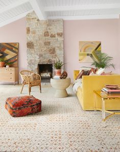 a living room filled with furniture and a fire place