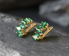 Gold Emerald Earrings set with created Emerald in a emerald cut, flawless clarity & green color, at 6x4 mm each (7 Cts a pair)Gold Vermeil ☞ thickest 18k Gold Plating over Solid 925 Sterling Silver ☞ made to last. Click here for ☞ Matching RingClick here for ☞ Matching Pendant Details:• Created Emerald in flawless clarity• Emerald: 6x4 mm each, 7 Ct a pair, diamond cut• Lever Back Closure - "English Lock"• Dimensions: Length 19mm, Width 9mm• 18k Gold VermeilSKU 2886 Green Baguette Cut Earrings For Gifts, Gold Emerald Earrings, Baguette Earrings, Baguette Earring, Morganite Pendant, Earrings Emerald, Hoops Gold, Matching Ring, Ruby Earrings