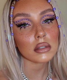 Purple Rave Hair, Purple Makeup Looks With Rhinestones, Lilac Purple Makeup Looks, Purple Gem Makeup, Purple Looks Makeup, Rhinestone Freckles, Rave Overalls, Purple Rhinestone Makeup, Violet Makeup Look