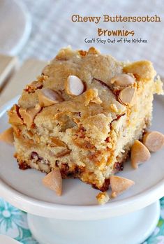 a close up of a piece of cake on a plate with almonds around it