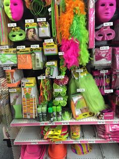 there are many different items on the shelves in this store, including masks and hair ties