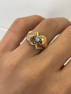 "Gold Spairel Tank Ring - 0.28CT Diamond, 18k Yellow Gold Ring, twister Ring, tourbillon Ring, Chunky Gold Ring, Estate Jewelry, Vintage ring \"Jewelry Material: Yellow Gold 18k (the gold has been tested by a professional) Total Carat Weight: 0.06ct (Approx.) Total Metal Weight: 4.23g Size: 7.25 US \\ 17.45 mm  Grading Results: Stone Type: Diamond Shape: Round Carat:0.06 ct (Approx.), Stones quantity: 1 Color: G Clarity: VS Modern Twist 14k Gold Rings With Single Cut Diamonds, Elegant Spiral Yellow Gold Diamond Ring, Modern Twist 14k Gold Diamond Ring, Modern Twist 14k Gold Round Diamond Ring, Modern Twist Yellow Gold Ring With Single Diamond, Elegant Spiral Yellow Gold Ring, Spiral Ring With A Modern Twist For Formal Occasions, Gold Rings With Single Cut Diamonds Modern Twist, Elegant Anniversary Ring With Rotating Bezel