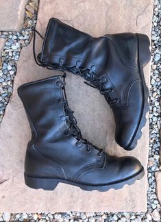 These are amazing vintage military boots. Eyelet and metal eye hooks lace up details.  Original laces, super cushioned inner area, and heavy-duty soles genuine leather throughout. [ MEASUREMENTS ] Size: Womens size 8  (marked mens size 5xw) Calf Height: 7" Heel: 1"  Width: 4" Sole Length: 11" Material: genuine leather  Color: black Label: Military Issued Condition: good, subtle wear, no flaws Leather Lace-up Combat Moto Boots, Military Style Steel Toe Boots, Military Steel Toe Round Toe Boots, Military Leather Combat Boots With Round Toe, Leather Military Combat Boots With Round Toe, Military Style Steel Toe Work Boots, Military Work Boots With Steel Toe, Military Steel Toe Work Boots, Military Lace-up Boots With Reinforced Toe