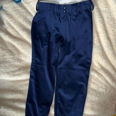 Nwot Women’s Softball Pant In Dark Royal Blue Color. Two Snap Waist, With Belt Loops. Blue Sports Pants With Tapered Leg, Blue Stretch Tapered Leg Sweatpants, Blue Tapered Leg Sports Pants, Blue Sports Bottoms With Pockets, Blue Full-length Sports Pants, Blue Bottoms With Elastic Waistband For Sports Events, Sporty Navy Pants With Pockets, Blue Sports Pants With Pockets, Blue Sporty Tapered Leg Bottoms