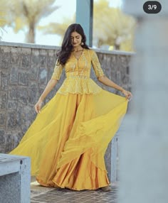 Sharara Dress For Haldi, Long Top For Lehenga, Haldi Long Frocks, Pithi Outfit Ideas, Haldi Lehanga Design, Formal Koti Men, Peplum Top For Lehenga, Lehanga Long Blouse, Haldi Skirt And Top