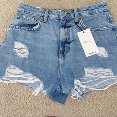 Light-Medium Wash Denim Shorts With Rips Forever 21 High-waisted Blue Jean Shorts, Forever 21 Medium Wash High-waisted Shorts, Forever 21 Blue Cutoff Shorts, Forever 21 Blue Jean Shorts, Forever 21 Blue High-waisted Shorts, Forever 21 Medium Wash Shorts, Forever 21 Medium Wash High-waisted Jean Shorts, Forever 21 Cutoff Jean Shorts For Summer, Forever 21 Light Wash High Rise Shorts