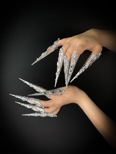 Original finger claws in silver color filigree, decorated with silver rhinestones. These versatile decorations are a great addition to any Christmas party, cosplay, summer festival, Burning Man look. Great props for the Snow Queen, Ice Queen, Winter Fairy. 100% designed and handmade by our designers ( SETA Design studio in Kyiv).  It will be securely packed in a box. Feel free to contact us if you have any questions.   We accept return. Contact us within 3 days of delivery. Delivery of goods is Finger Claws, Nails Ice, Metal Claws, Ice Witch, Queen Sugar, Claw Rings, Ice Jewelry, Jewelry Nails, Nail Guards