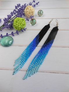 long blue earrings long beaded earrings handmade bohemian | Etsy Blue Beaded Long Drop Jewelry, Handmade Blue Chandelier Earrings For Festival, Unique Blue Earrings For Summer, Bohemian Long Drop Blue Jewelry, Bohemian Blue Long Drop Jewelry, Blue Dangle Chandelier Earrings For Summer, Handmade Blue Long Drop Jewelry, Colorful Beaded Long Drop Earrings, Handmade Blue Bohemian Beaded Earrings