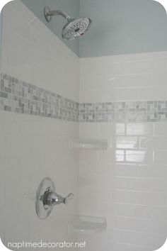 a white shower with the words goodbye 1965, hello 2 share on it and an image of someone's bathroom