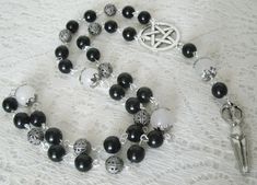 "This beautiful wiccan rosary has black obsidian beads, onyx beads, sterling silver plated bead caps, sterling silver plated filigree beads, pewter silver pentacle and a pewter silver goddess. A lovely way to pray to the Goddess and meditate. 20\" long." Black Gothic Jewelry With 8mm Beads, Spiritual Obsidian Beaded Jewelry, Mystical Black Jewelry For Healing, Goddess Magic, Silver Goddess, Wicca Jewelry, Wiccan Jewelry, Pagan Jewelry, Onyx Bead