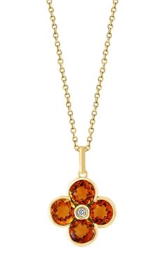 A semiprecious stone flower pendant brings sparkling color to an elegant 14-karat yellow-gold necklace centered by a dainty diamond. 18" length; 1/2"W x 3/4"L pendant Lobster clasp closure Total diamond weight: 0.02ct. Color: H–I Clarity: I1–I2 14k gold/citrine, London blue topaz, amethyst and/or peridot/diamond Made in the USA Diamond Guide Yellow Gold Flower Shaped Gemstone Necklace, Yellow Gold Flower Necklace With Gemstone, Yellow Gold Gemstone Necklace In Flower Shape, Yellow Gold Flower-shaped Gemstone Necklace, Elegant Birthstone Necklace With Flower Pendant, Diamond Flower Pendant, Diamond Guide, Flower Pendant Necklace, Diamond Flower