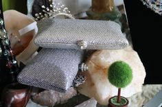 Lovely silver or gold or gray hard side metalic sides with rhinestone clasp with rhinestone clutch bag perfect your wedding or formal event! Silver Clutch For Formal Occasions, Luxury Silver Cocktail Evening Bag, Elegant Rectangular Metallic Silver Bag, Silver Evening Bag With Rhinestones For Cocktail, Silver Clutch With Rhinestones For Formal Occasions, Silver Rhinestone Evening Bag For Cocktail, Formal Silver Clutch With Rhinestones, Luxury Silver Clutch For Cocktail Events, Luxury Silver Clutch For Cocktail