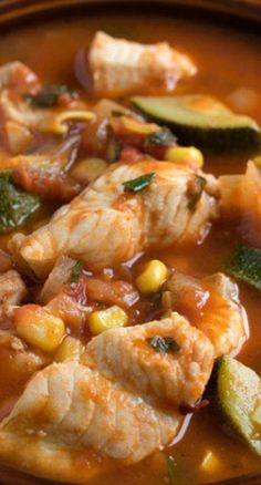 a close up of a bowl of food with meat and vegetables