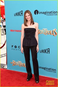 the actress is posing on the red carpet at the movie's world premieres